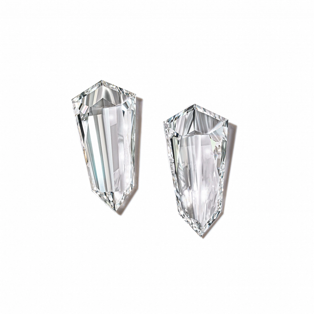 Пара бриллиантов огранки Kite 0.60 и 0.66ct 1
